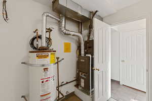 Utilities with strapped water heater