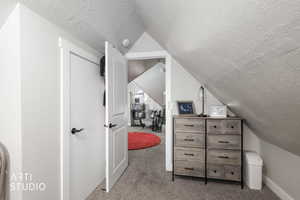 Additional living space with carpet flooring