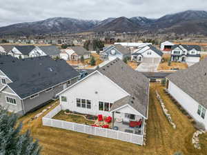 Aerial view of residential area with a mountainous background