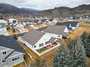 Aerial view of residential area featuring mountains
