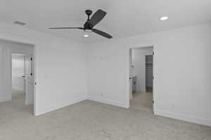 Unfurnished bedroom with light carpet, recessed lighting, and ceiling fan