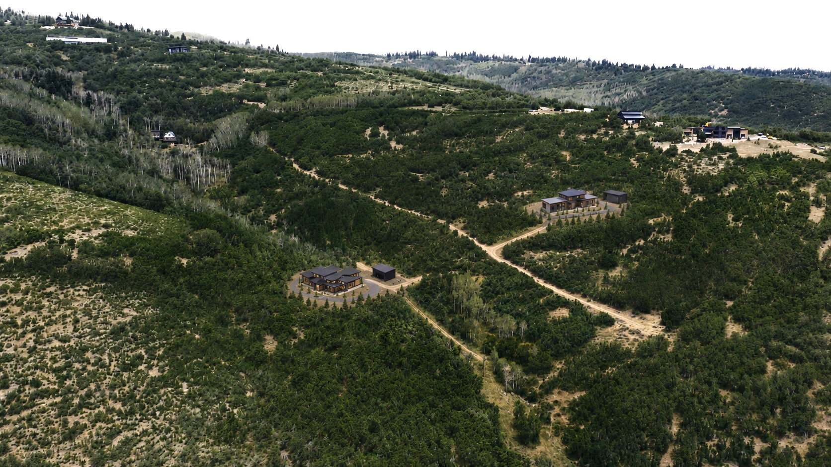 Expansive, verdant landscape featuring a substantial residence with a dark exterior, a detached outbuilding, and a winding unpaved access road