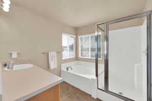 EnSuite Bathroom with a separate tub and shower