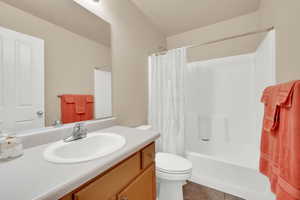 Full bath with shower / bath combination and vanity