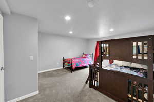 Bedroom with recessed lighting