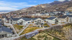 Aerial view of residential area with a mountainous background