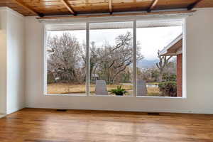 Floor to ceiling windows brings the outside indoors