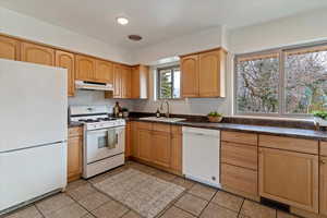 Bright and airy kitchen with mountain views