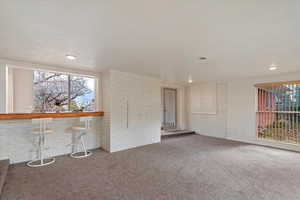 Family looking into living room