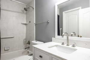 Full bathroom with vanity and bathing tub / shower combination