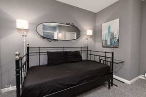 Bedroom featuring carpet floors