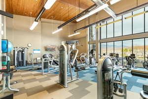 Gym with a high wood ceiling