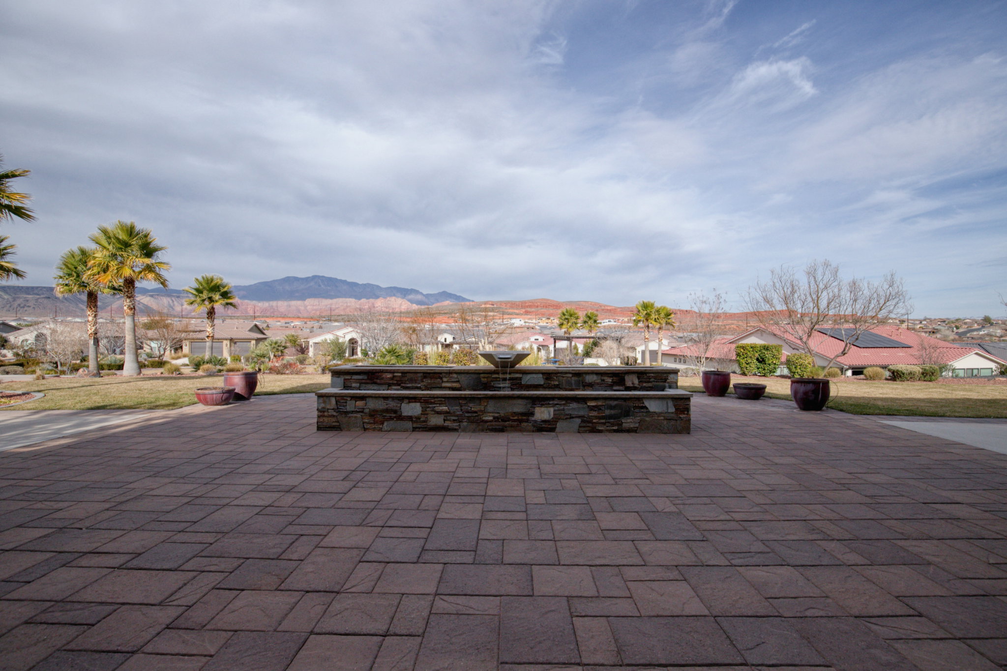 View of patio with a residential view and a mountain view