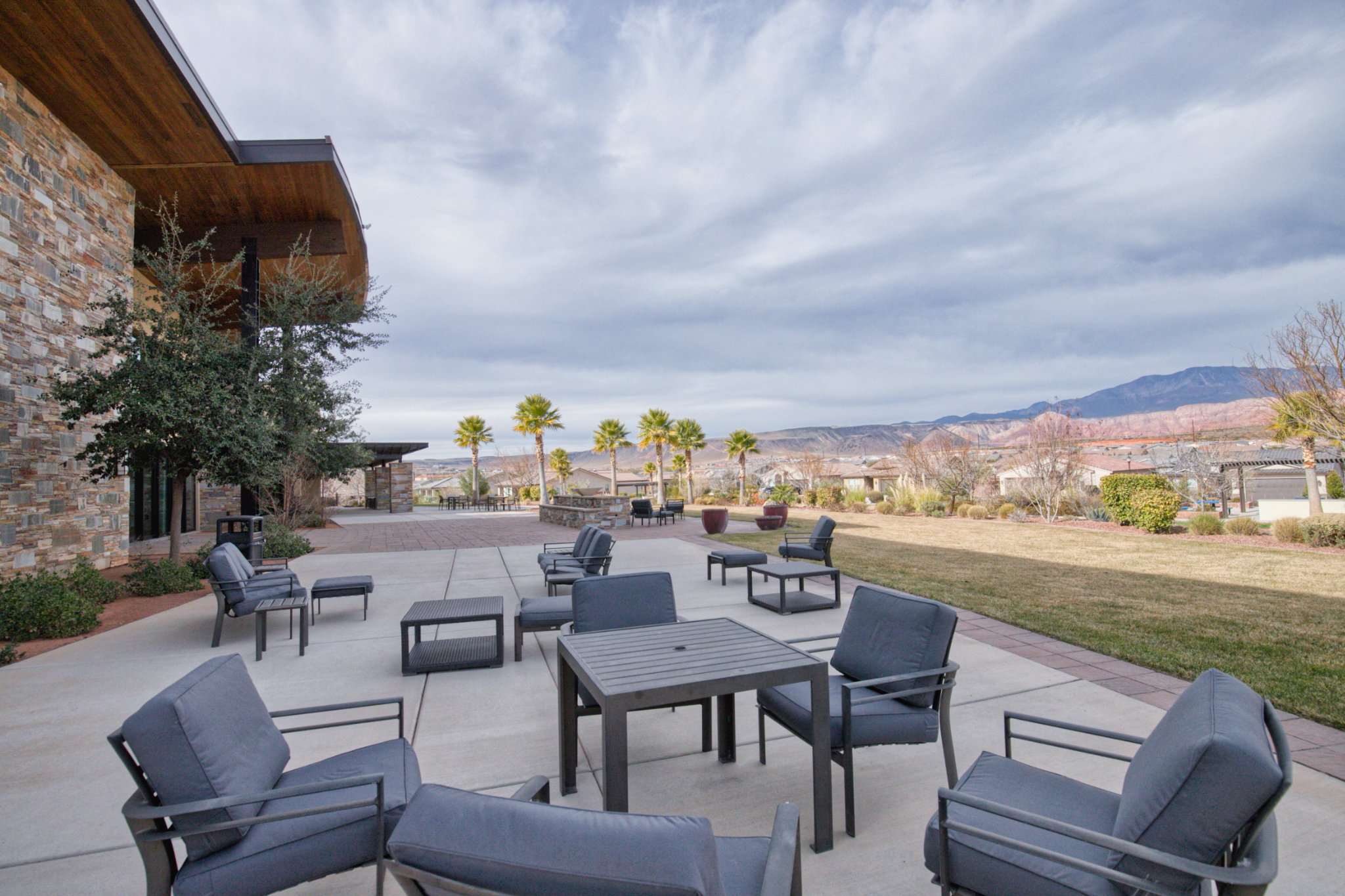 View of patio with a mountain view and an outdoor lounge area