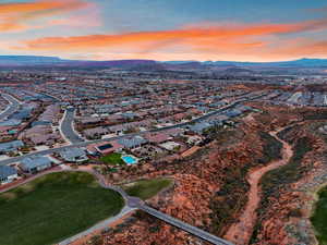 Aerial view of residential area featuring a mountainous background