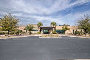 View of front of property with stucco siding and stone siding