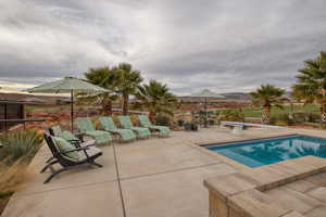 View of pool featuring patio surround