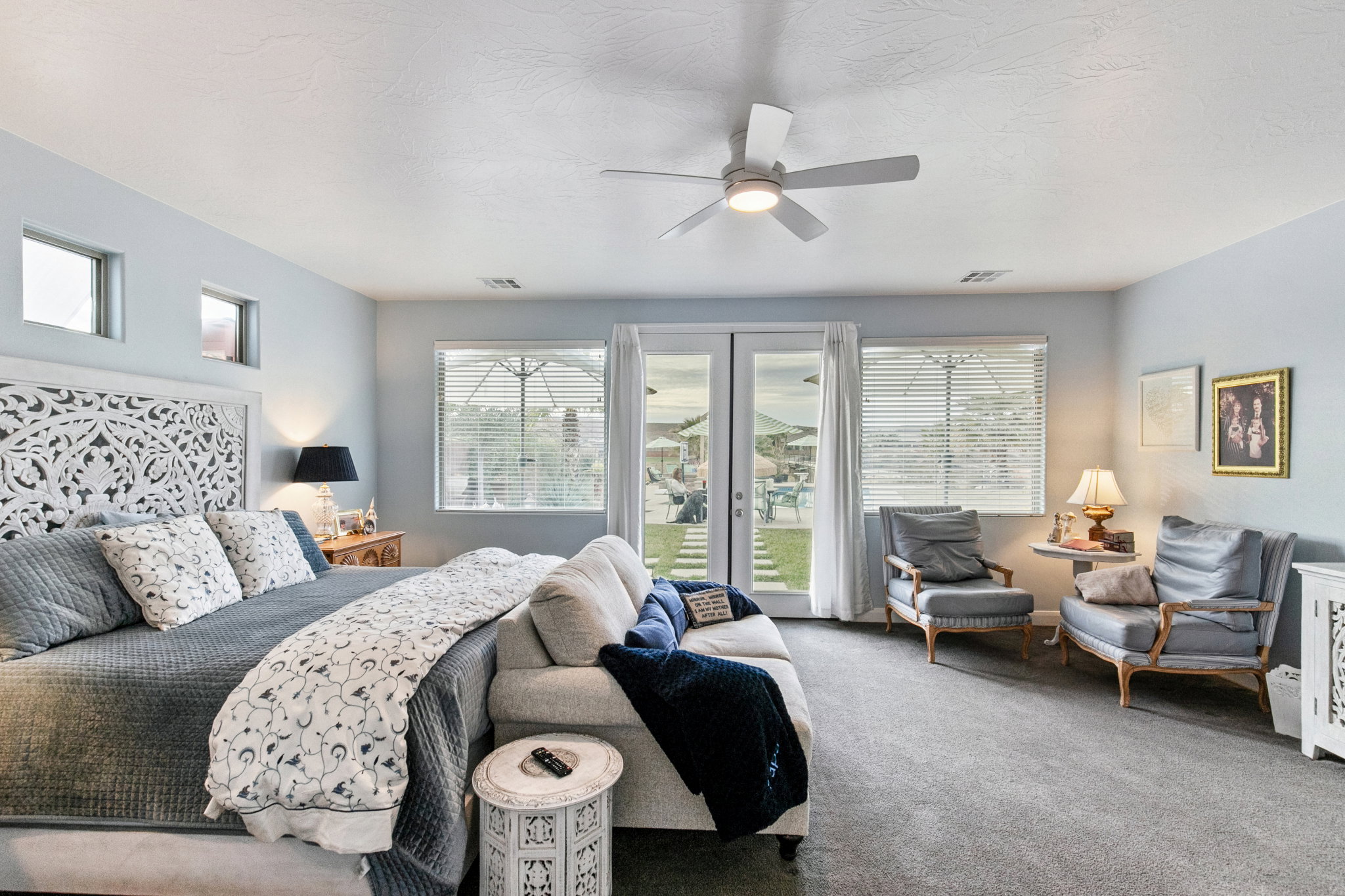 Bedroom featuring carpet, ceiling fan, access to outside, and french doors