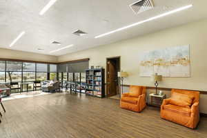 Building lobby featuring a textured ceiling