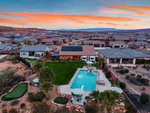 Aerial perspective of suburban area with a pool area