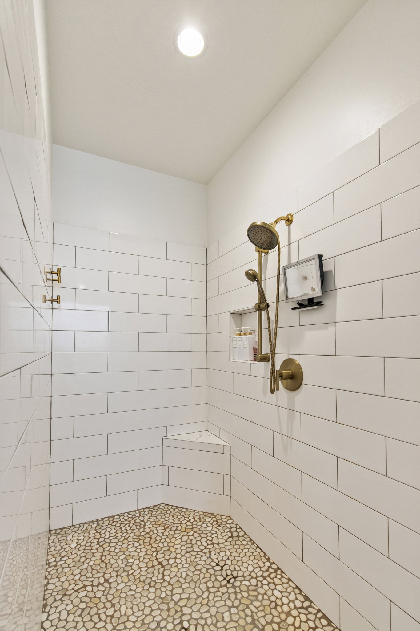 Bathroom featuring tiled shower
