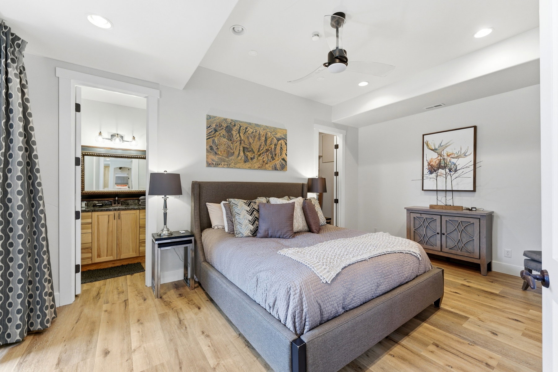 Bedroom featuring light wood-finish flooring, recessed lighting, and a ceiling fan