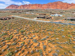 View of mountain backdrop featuring a desert landscape