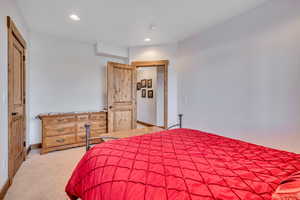 Bedroom featuring carpet flooring and recessed lighting