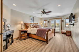 Bedroom featuring french doors, access to exterior, light wood-type flooring, ceiling fan, and recessed lighting