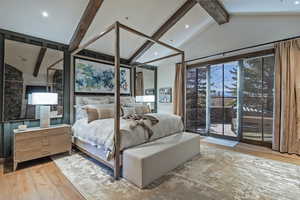 Bedroom featuring light wood-style flooring and access to exterior