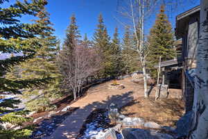 View of yard with a fire pit