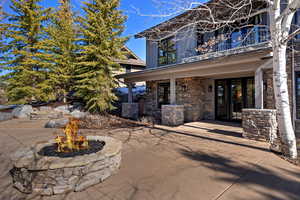 Patio / terrace featuring a fire pit and a patio area