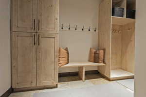 Mudroom featuring baseboards