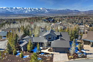 Aerial perspective of suburban area with a mountainous background
