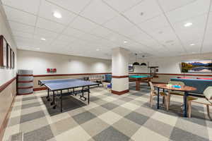 Playroom featuring recessed lighting, a paneled ceiling, and billiards