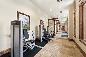Workout room with recessed lighting
