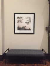 Detailed view of wood finished floors and baseboards