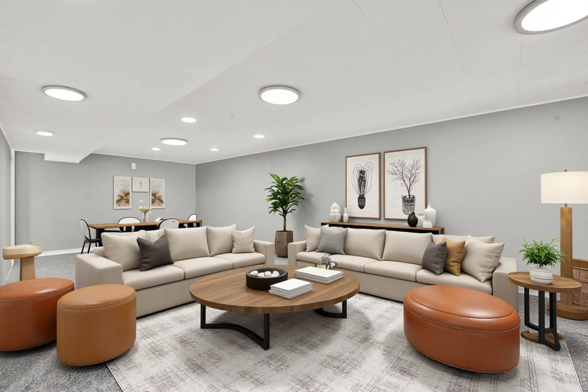 Spacious living room area featuring light gray walls, recessed lighting. Virtually staged to illustrate the home's potential.
