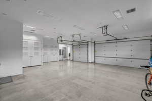 Garage featuring baseboards