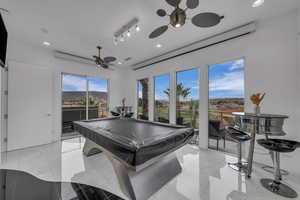 Playroom with billiards, recessed lighting, ceiling fan, and light marble finish flooring