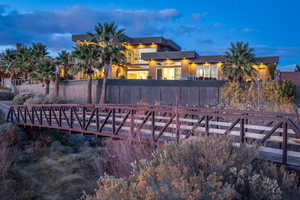 Rear view of house featuring stucco siding