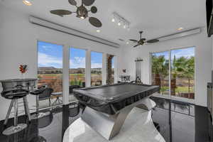 Recreation room with pool table, a ceiling fan, and recessed lighting