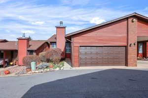 View of front facade with a garage.  New garage door