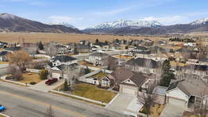 Aerial perspective of suburban area with a mountain backdrop
