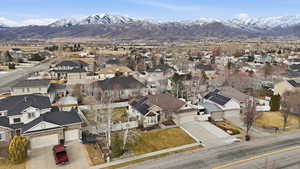 Aerial view of residential area with a mountainous background