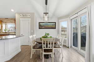 Dining space featuring light wood-style floors and recessed lighting