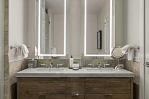 Full bathroom with double vanity