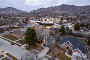 Aerial view of residential area featuring a mountain backdrop