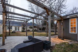 View of patio with a pergola and french doors