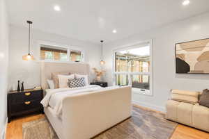 Bedroom featuring light wood finished floors and recessed lighting